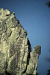 The New River Gorge, famous  for its bands of sandstone cliffs, draws climbers from all over the world.